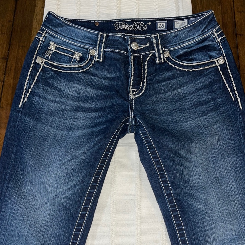 Miss me boot cut jean. Rhinestone pocket . Size 28